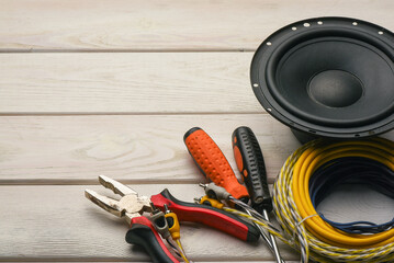 Car audio stereo system installation concept background. Car audio system repair service concept.
