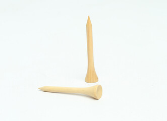 wooden golf tees isolated on white background