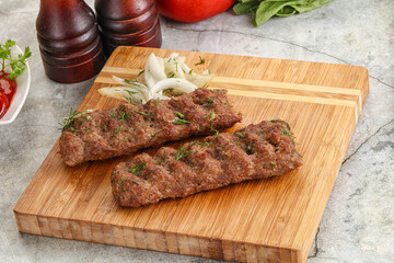 Kebab with beef served onion
