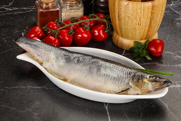 Whole raw salted herring fish