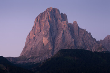 The northern side of Sasso Lungo at sunrise from the Val Gardena area
