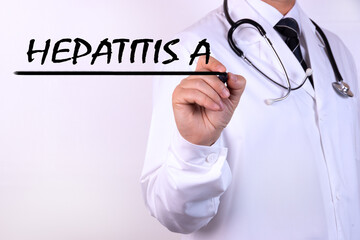 Doctor writing word Hepatitis A with marker Medical concept