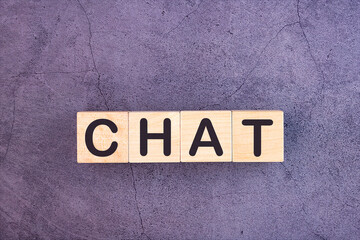CHAT word made with wood building blocks.