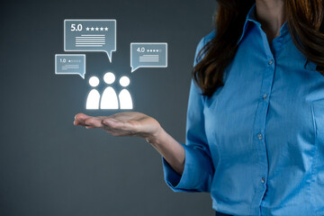 Businesswoman holding hologram and got a star rating review for the store.	
