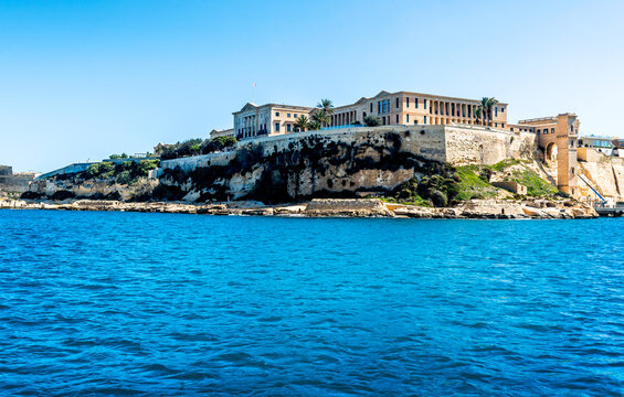 The complex of the Bighi Royal Naval Hospital seen from the sea. Valletta, Malta