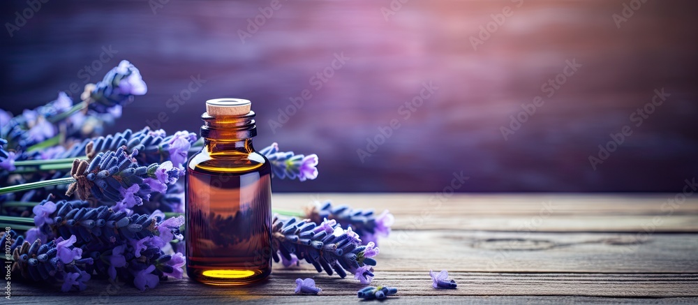 Poster a relaxing lavender essential oil with its soothing aroma captured on a beautiful blue textured wood