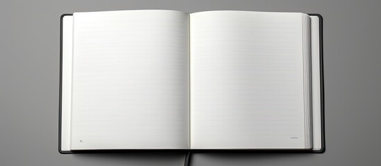A notebook with an opened page clear and ready for content offering ample space for writing or drawing