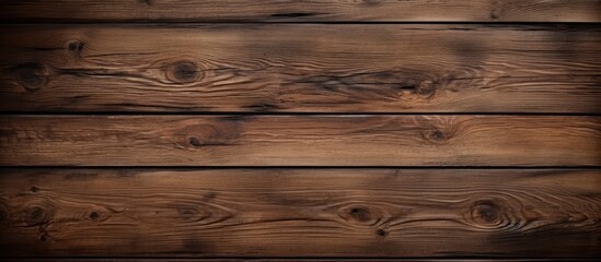 Obraz premium A horizontal wooden background with a dark texture provides an empty surface offering ample space for a design or copy space image