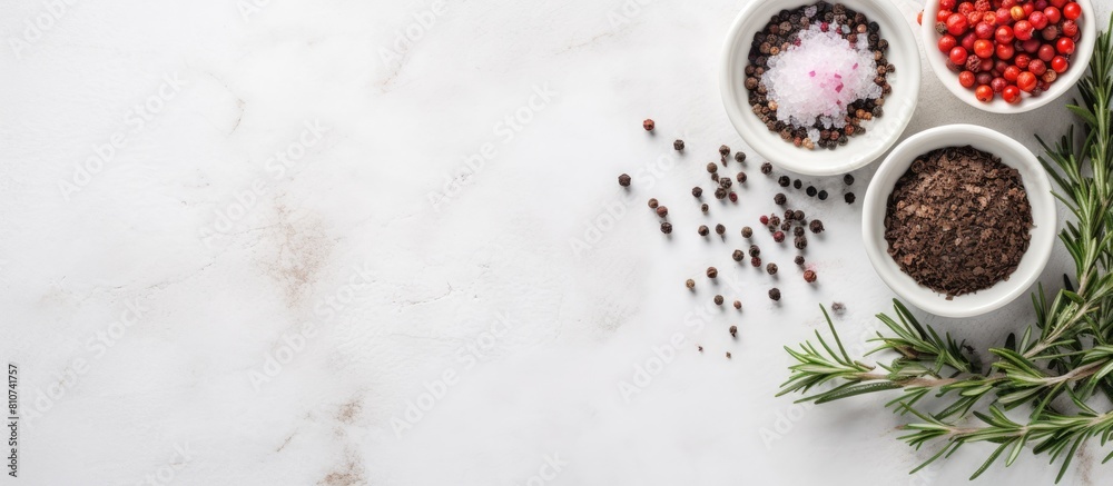 Aufkleber A bowl of salt thyme and peppercorns placed on a white marble table ideal for a flat lay composition The image offers ample space for adding text