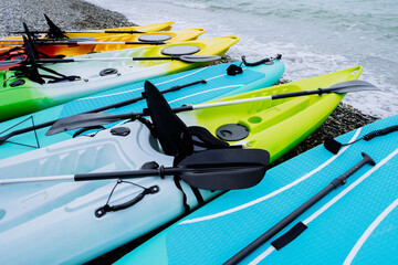 Kayaks and SUP boards on the sea. Extreme sport. Leisure. High quality photo