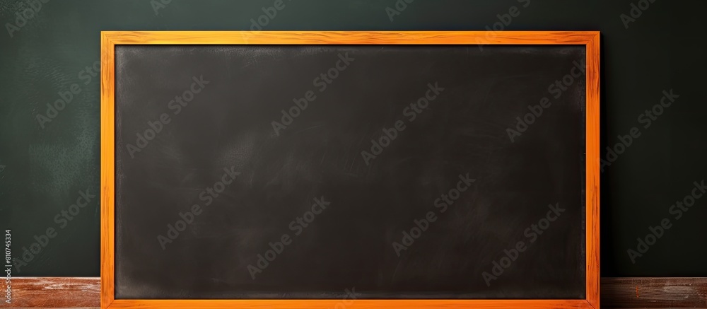 Aufkleber the orange background features a blank chalkboard providing ample copy space for creative content
