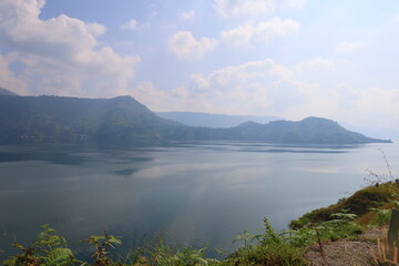Stunning scenery of volcanic lake Toba - largest and deepest crater lake in the world located in...