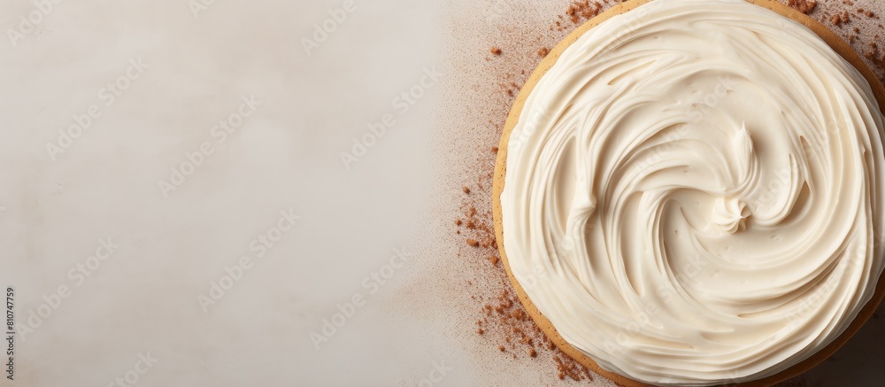 Poster Top view of a cake with creamy frosting set against a food background Perfect for menu concepts with copy space for text