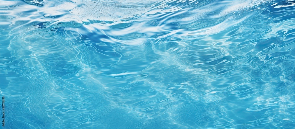 Poster A high resolution background image of a swimming pool filled with water featuring a textured abstract or rippling wave pattern. Creative banner. Copyspace image