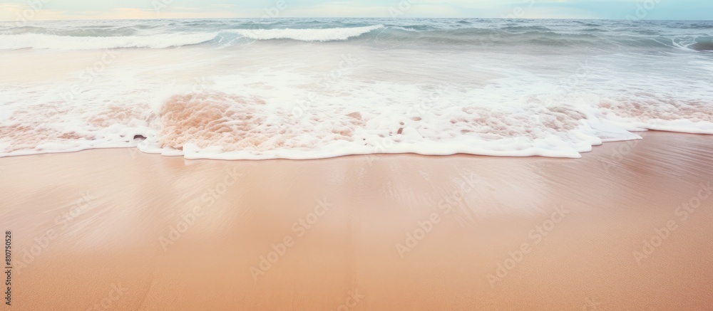 Poster a close up image of the sea coast showcasing the texture and background of the sand and water provid