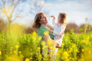 Mother and child in flower field