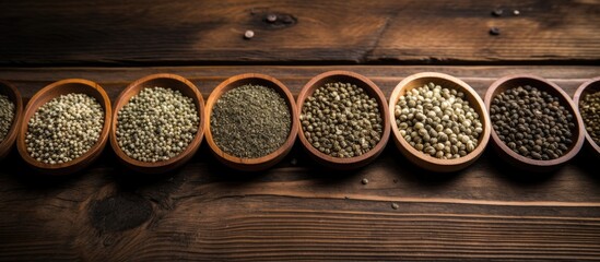 A copy space image showcasing hemp seeds arranged on a rustic wooden surface representing their role as a nutritious and healthy food option