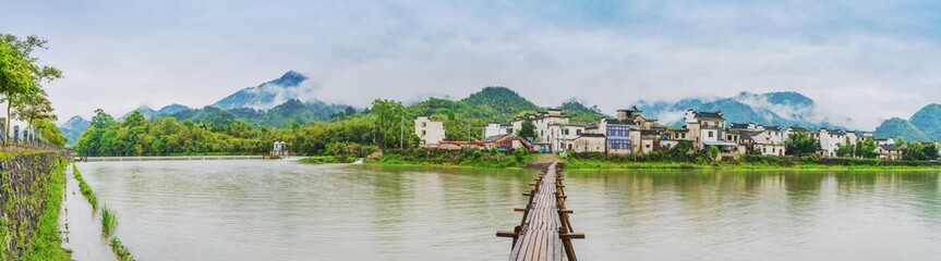 Obraz premium Ancient Towns, Ancient Buildings, and Rivers in the Mountainous Areas of Anhui Province, China 
