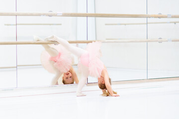 Little ballerina at ballet class