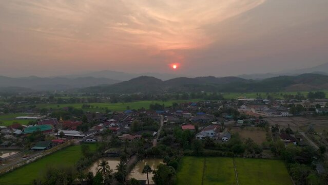 Aerial View landscape water flowing and life of thai people fishery, Aerial Drone View of Sakae Krang River and home villages near the river at Uthai Thani Province in Thailand