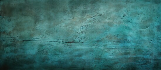 An abstract grunge background with a vignette showcasing a cyan decorative plaster texture Ideal for design purposes with copy space available