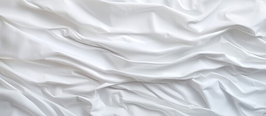 A background of white paper texture with wrinkles suitable for designing or working with a copy space image