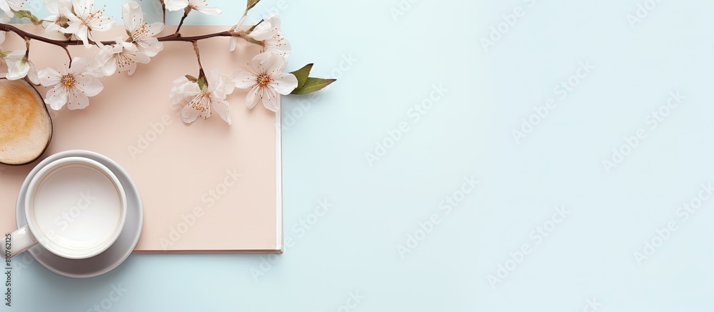Poster top view of a beautifully arranged workspace desk with a coffee cup and a notebook this feminine and