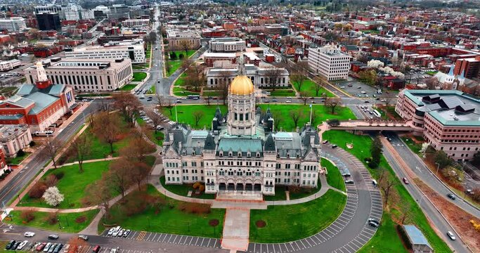 Beautiful building of Connecticut State Capitol in Hartford, CT, USA. Drone flying around the establishment at daytime.