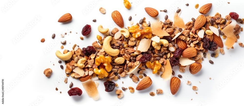 Aufkleber Top view of a homemade granola with a variety of nuts and seeds spread on a baking sheet Perfect as a healthy breakfast option with a white background and enough space for additional images or text