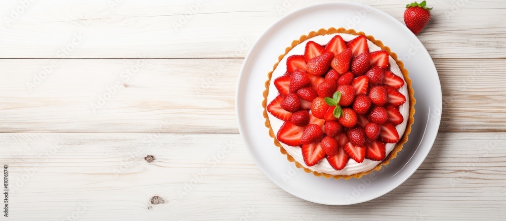 Wall mural Top view of a delectable American strawberry dessert placed on a white wooden table The sweet dish features a combination of tart cake and pastry creating a mouthwatering treat Ample copy space image - Wall murals