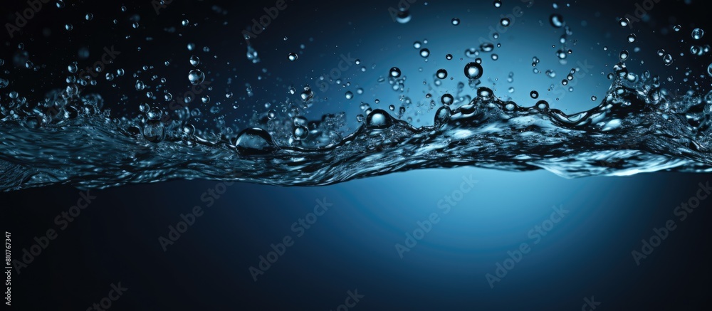 Leinwandbilder a copy space image showcases refreshing blue water droplets splashing onto a black backdrop symboliz