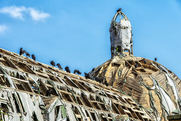 An old church roof in the Barranco district of Lima is damaged almost beyond repair and has...