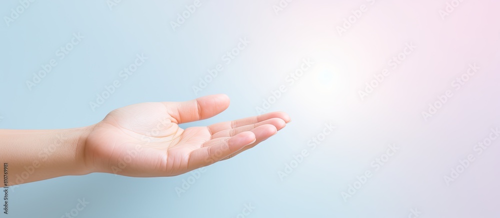Poster a hand holds a blank card with a pastel background providing a space for copying images. creative ba