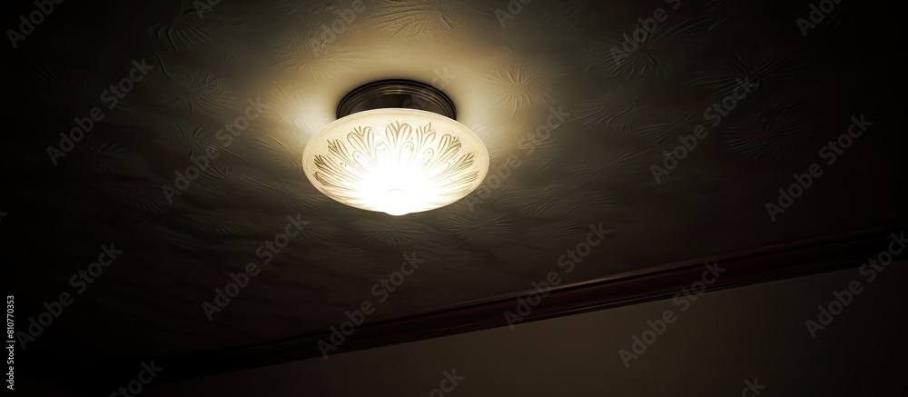 Aufkleber a ceiling with a dimly lit lamp copy space image