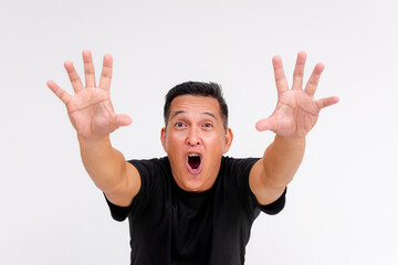 Fototapeta premium Shocked Middle-Aged Asian Man Desperately Reaching Out, Isolated on White