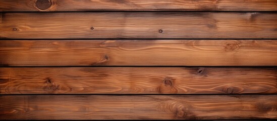 Fototapeta premium The background showcases a textured brown wood surface with plenty of copy space for images