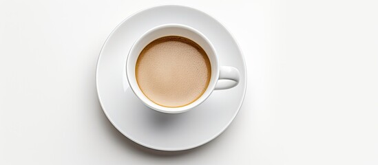 A clean and simple copy space image featuring a white coffee cup set against a pristine white background