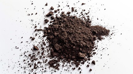 Top view of flying soil dirt piles, meticulously scattered on a white background with studio lighting to capture detailed textures