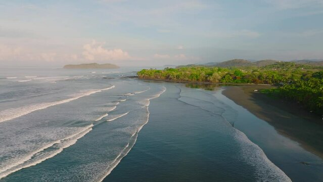 Drone shot of wild beach in Panama during a sunrise