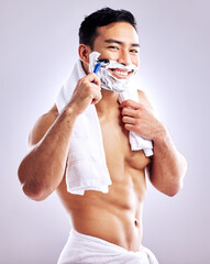 Portrait, happy man and shaving face with razor in studio for cleaning, health or hair removal for...