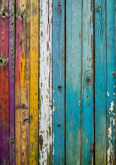 Rustic old wooden planks background texture with colorful weathered paint.