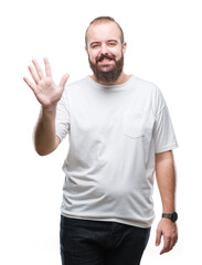 Young caucasian hipster man wearing casual t-shirt over isolated background showing and pointing up with fingers number five while smiling confident and happy.