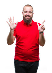 Naklejka premium Young caucasian hipster man wearing red shirt over isolated background showing and pointing up with fingers number seven while smiling confident and happy.