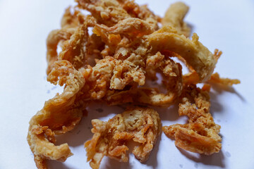 Crispy Fried Oyster Mushroom or Jamur Krispi. Oyster Mushroom Coated with Spiced Flour and Deep Fried. isolated on white, stock photo.