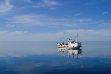 Lake Baikal is located in Eastern Siberia. It is the deepest lake on the planet and the largest natural freshwater reservoir, as well as the largest freshwater lake in Eurasia by area. 