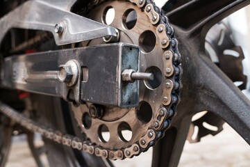 Detail of a motorcycle rear chain. Macro of motorcycle chain, stock photo.