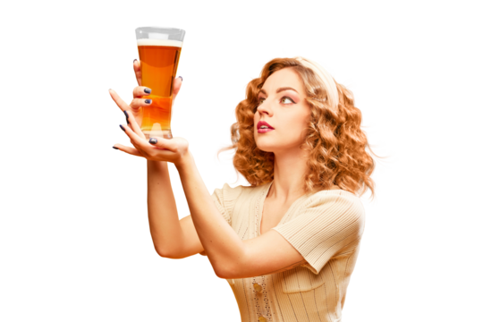 Pub party. Young redhead girl, Oktoberfest waitress wearing vintage dress holding beer glass against transparent background. Concept of alcohol, degustation, festival, vacation, Bavarian culture