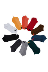Close-up shot of 10 pairs of cotton socks for women. A set of women's colorful short socks are isolated on a white background. Top view.