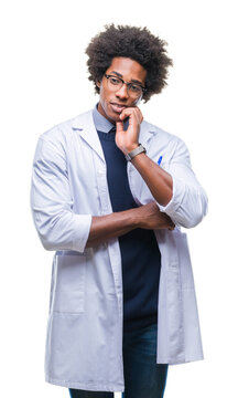 Afro american doctor scientist man over isolated background thinking looking tired and bored with depression problems with crossed arms.