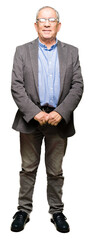 Handsome senior businesss man wearing glasses with serious expression on face. Simple and natural looking at the camera.